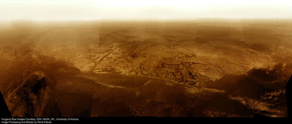 Here is a real image of Titan's surface, stitched together using images taken from the Huygen's probe, as it made its descent through Titan's atmosphere. Click the Image For More Information