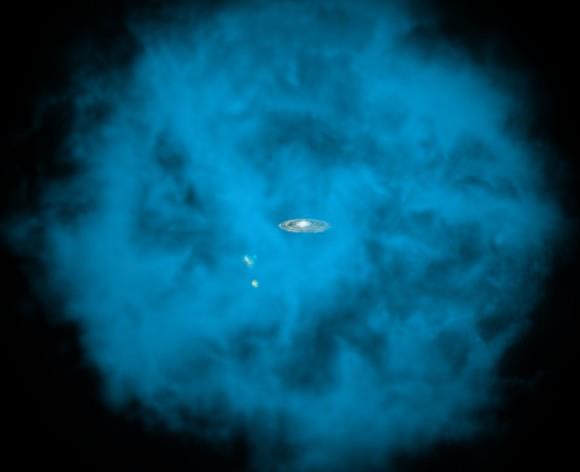 This artist's illustration shows an enormous halo of hot gas (in blue) around the Milky Way galaxy. Also shown, to the lower left of the Milky Way, are the Small and Large Magellanic Clouds, two small neighboring galaxies. The halo of gas is shown with a radius of about 300,000 light years, although it may extend significantly further.