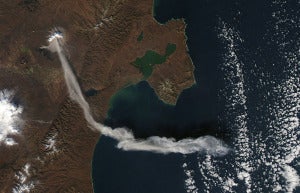 Shiveluch Volcano, on Russia's Kamchatka Peninsula, erupted on October 6, 2012, sending a plume of ash high into the air, carried first south, then east, as winds shifted. Shiveluch is one of the biggest and most active volcanoes on the Kamchatka Peninsula.