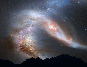 How the collision might look from a planet in the Milky Way (Credit: NASA, ESA, Z. Levay and R. van der Marel (STScI), T. Hallas, and A. Mellinger)
