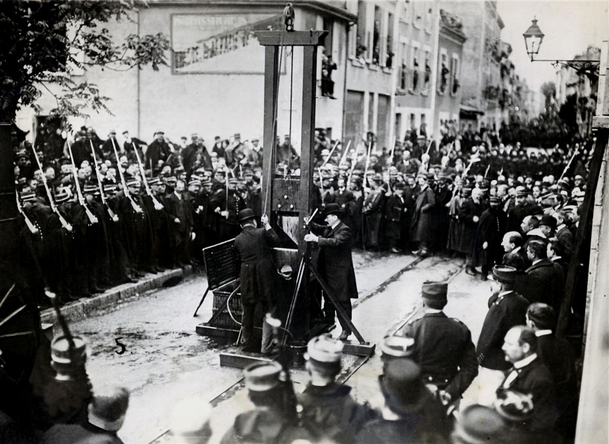 Executioners preparing for a public beheading