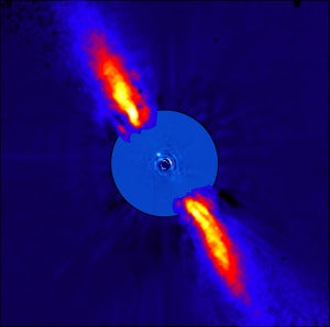 Composite image showing the intense light produced by this young star, and other very faint light sources, like those from the comets. Image Credit: ESO