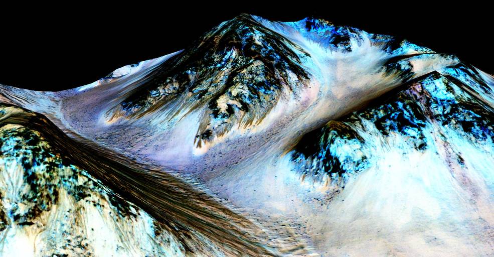 The dark, narrow streaks on Mars were inferred to be have been formed by flowing waters. Source: NASA/JPL/University of Arizona