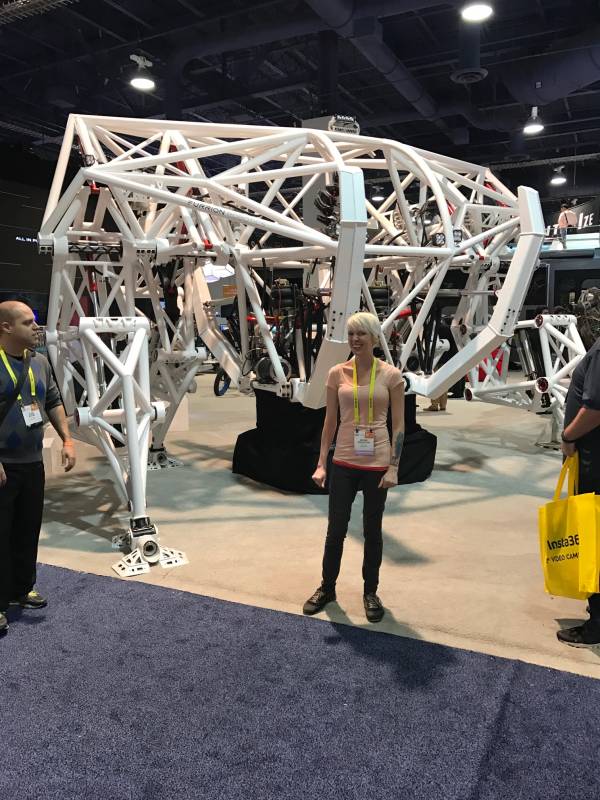 Futurism's Jolene Creighton cheerfully poses in front of her next vehicle. It should make beating New York's rush hour traffic a cinch. Credit: Futurism