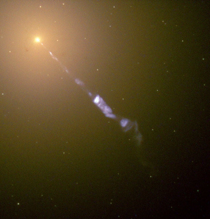 The Beam of Plasma Emitted from M87's Central Black Hole. Image Credit: NASA and The Hubble Heritage Team