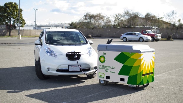 An EV being charged by a BP branded charging station. Image Credit: BP