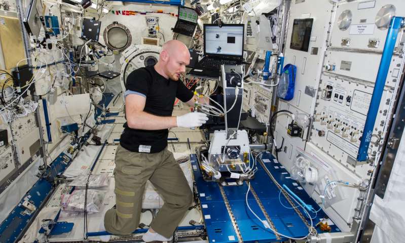 Alexander follows instructions from the computer during his mission to ISS in 2014. Image Credit: ESA/NASA