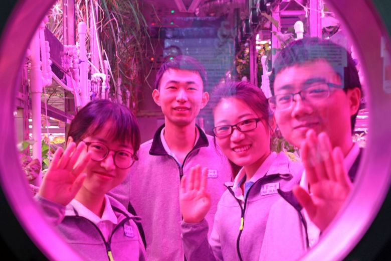 Four students faced the challenges of 200 days in the Lunar Palace. Image Credit: AFP