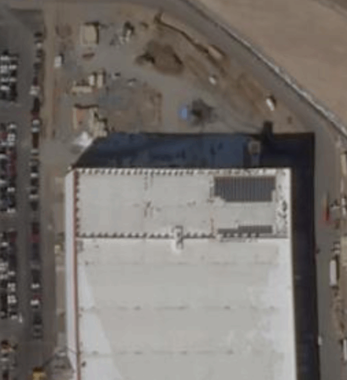 Aerial image of Gigafactory 1 in Nevada showing the small section of solar panels. Image Credit: Building Tesla