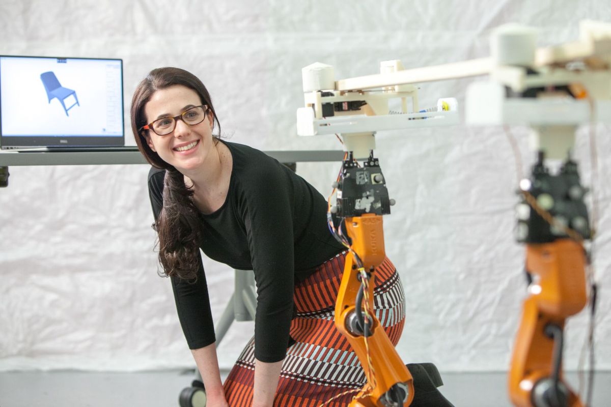 This is Adriana Schulz pictured with the hardware/software workflow. Image Credit: Jason Dorfman, MIT CSAIL