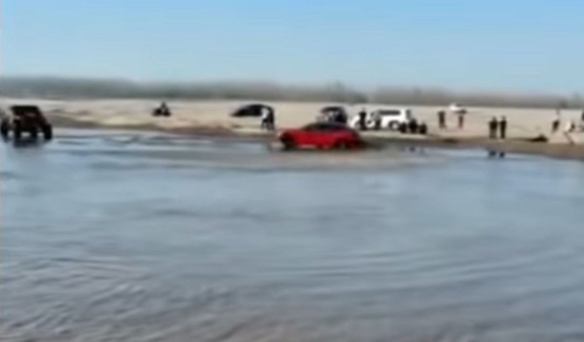 Watch This Maniac Drive His Tesla Through the Ocean