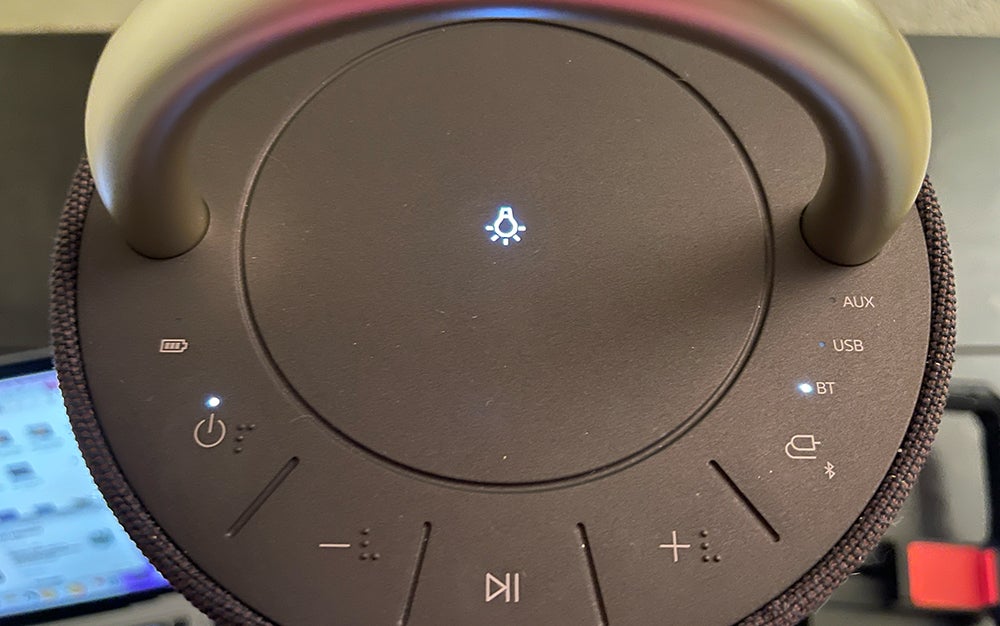 The top of the LG XBOOM 360 touch panel controls sound, power, and the mood light.